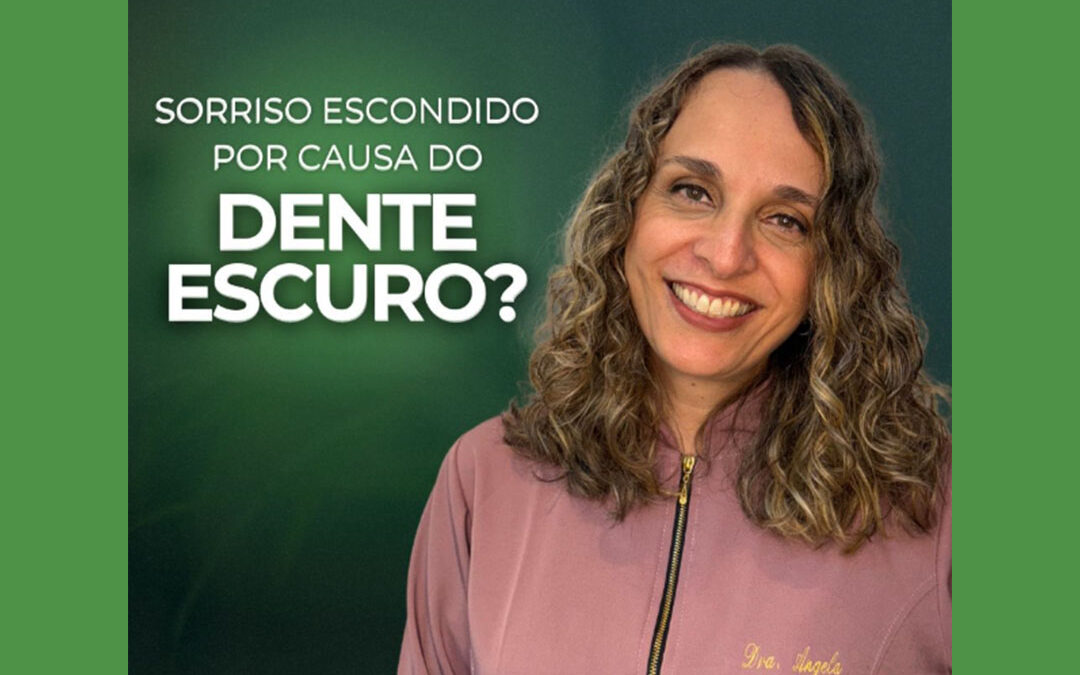 Sorriso escondido por causa do dente escuro?